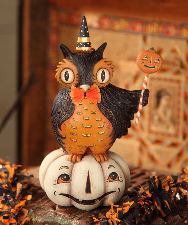 Perched Owl On Pumpkin